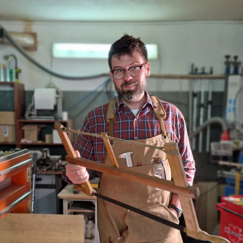 Michał Fudalej, at the ChessboArt workshop with his Great-Great-Grandfather's wood saw