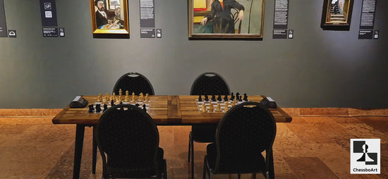 A detailed video showcase of the modular bughouse chess tabletop by ChessboArt. The video pans over the solid Iroko wood, highlights the pearl-white epoxy inlays, and shows the table's 5-piece modular construction.